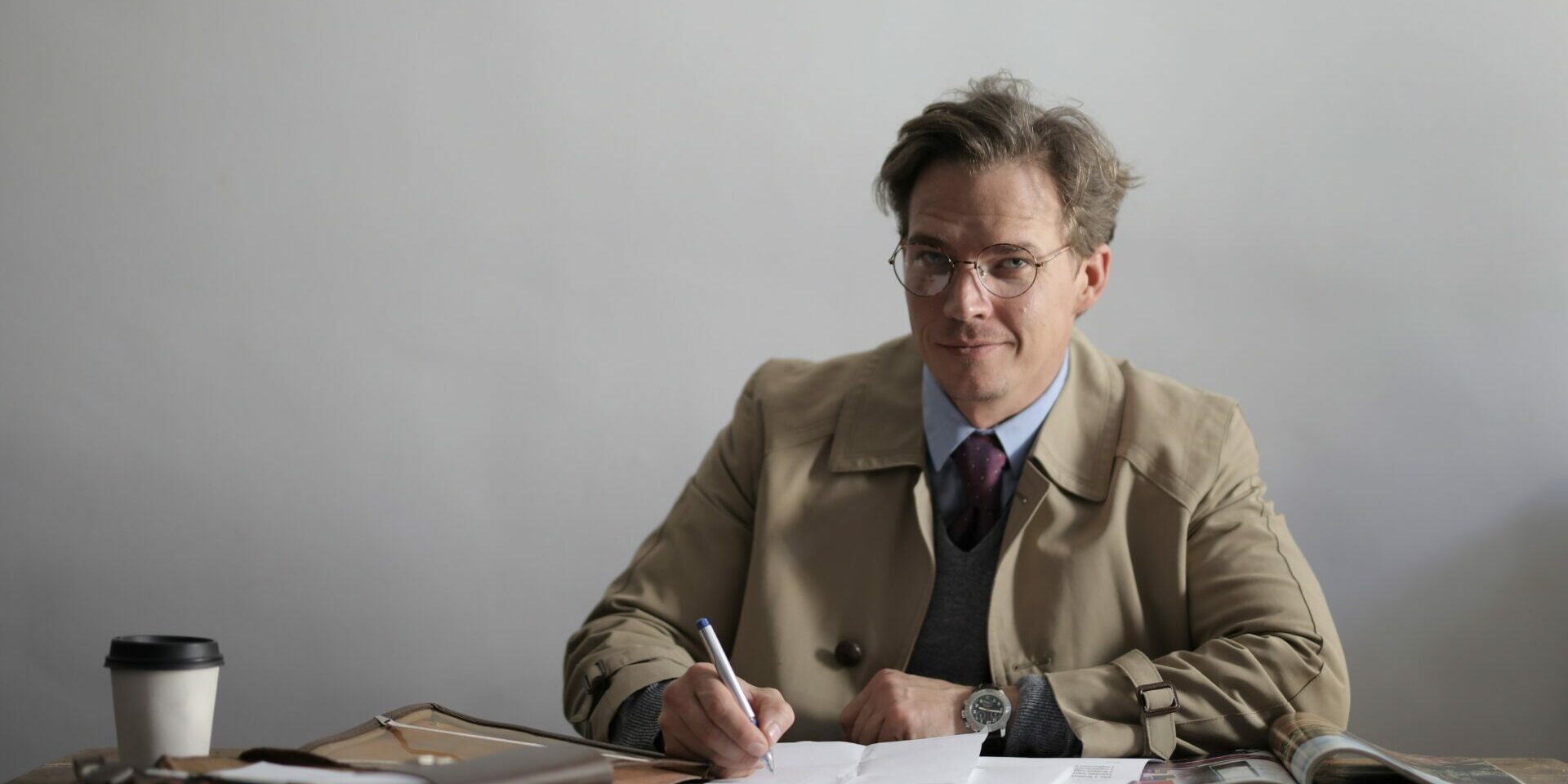 serious-male-manager-writing-in-papers-while-working-at-3931399 document unique coronavirus